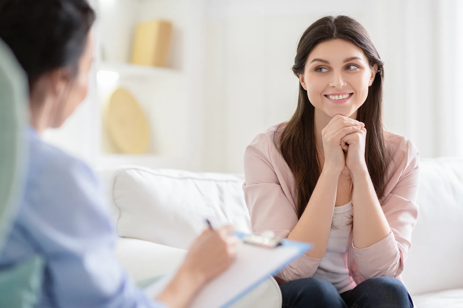 A woman in a supportive counseling conversation
