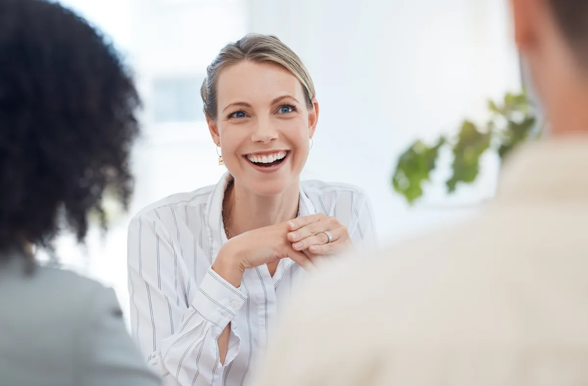 A woman smiling with confidence