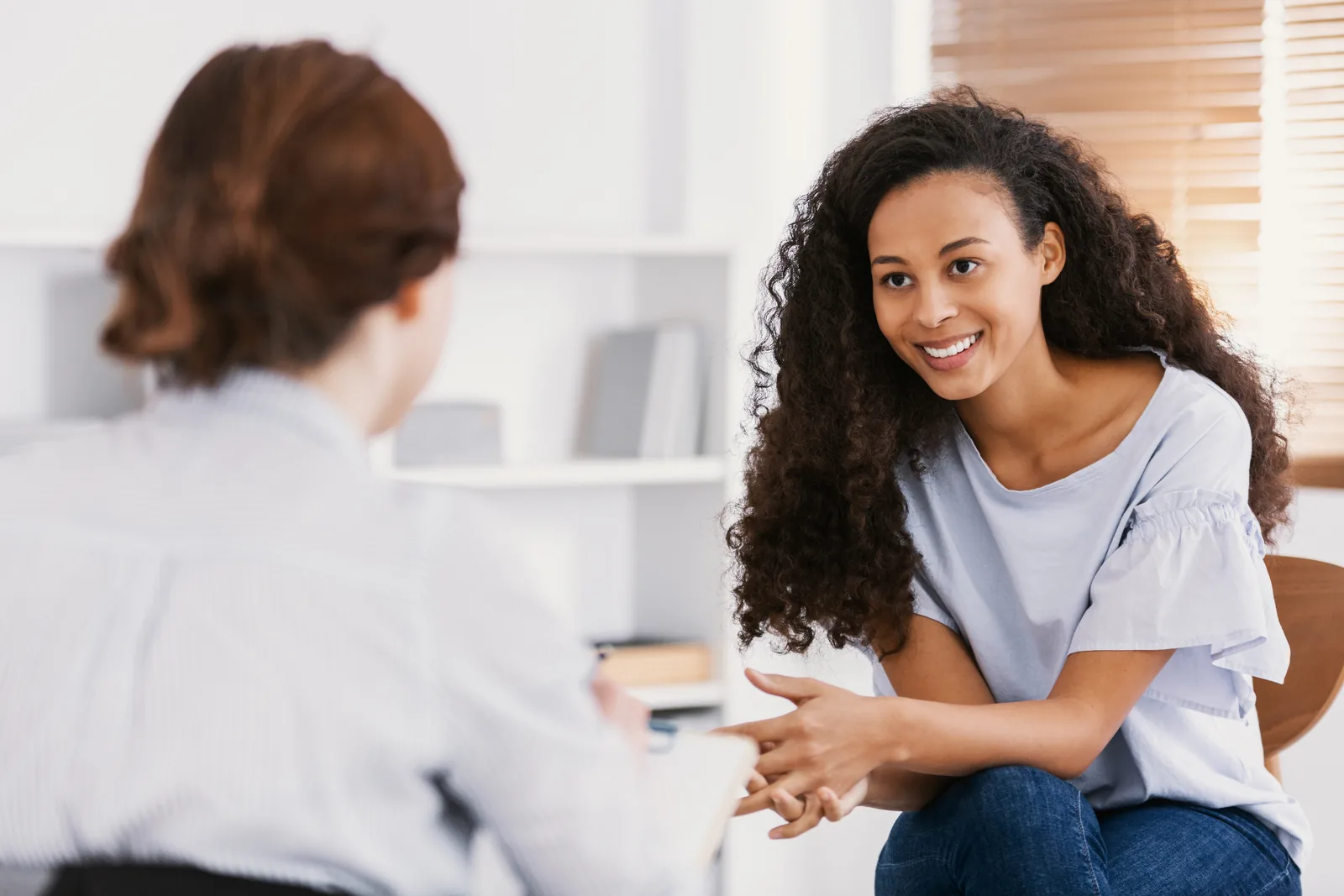 A woman supported during a counseling session